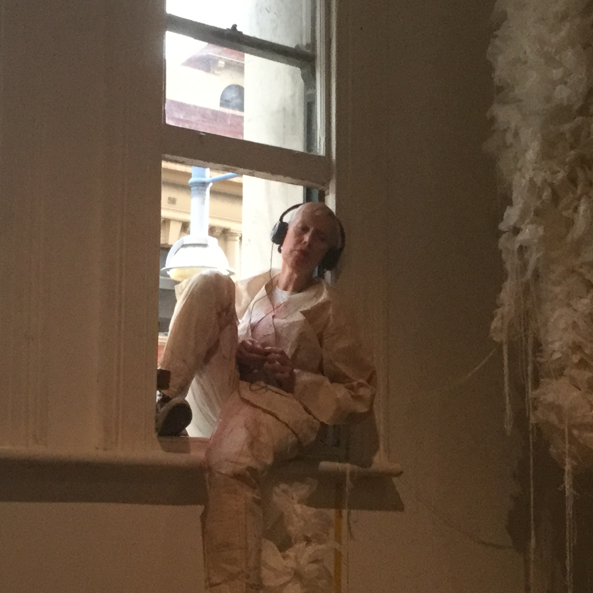 III+P — V Barratt with headphones at window, Format Systems Inc, 2017